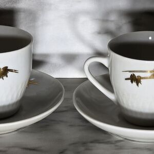 White Porcelain Teacup and Saucer Set with Gold Accent